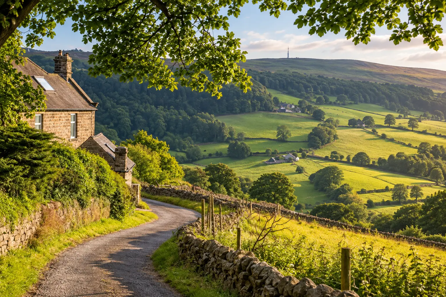 Stone cottage above a sunlit green valley